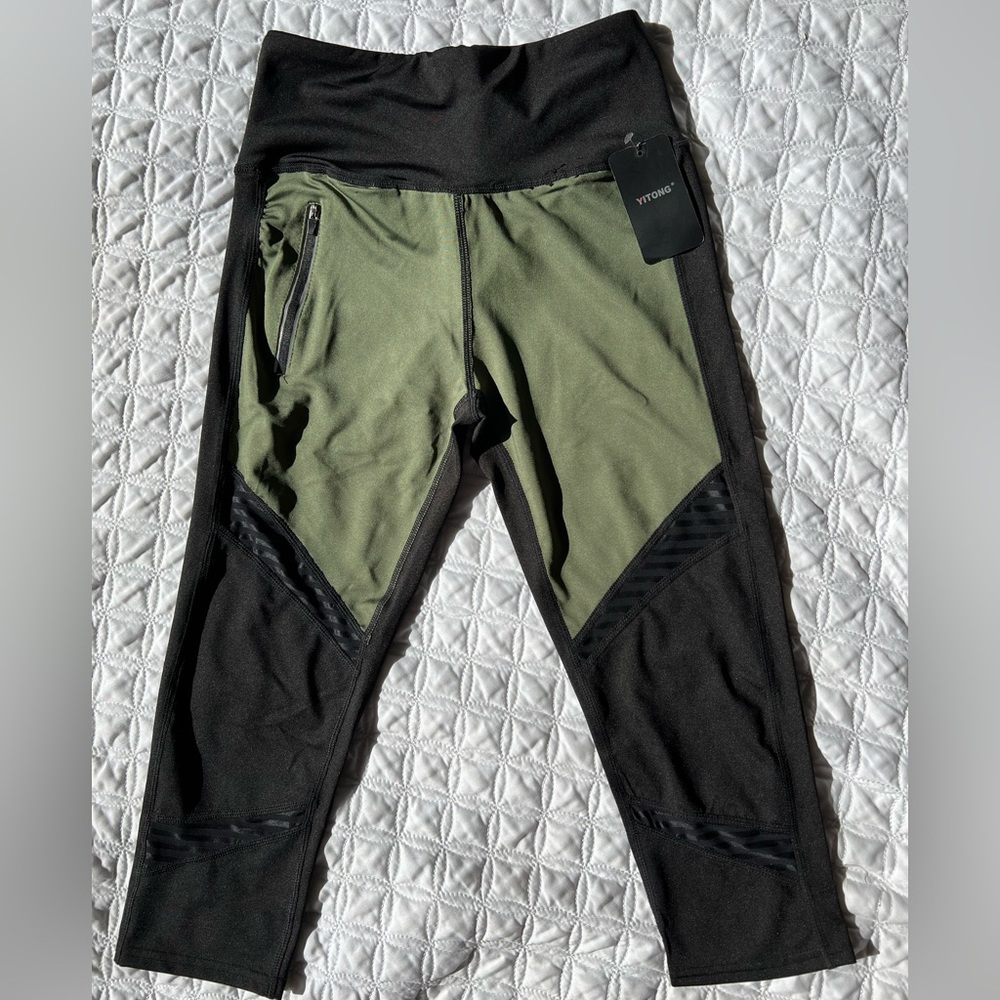 Green and black capri leggings